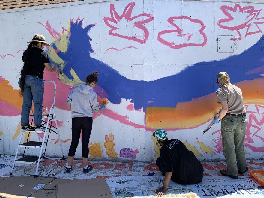 A community mural — art that belongs to a neighborhood, not an institution.